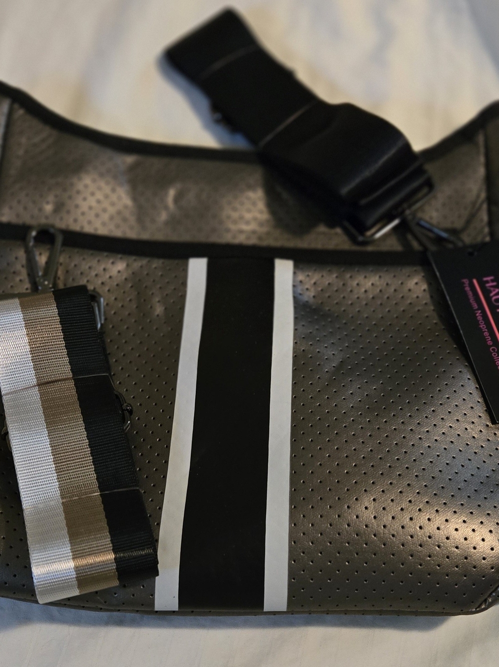 Haute Shore Perforated Crossbody Bag in Olive Green with Black & White Stripe